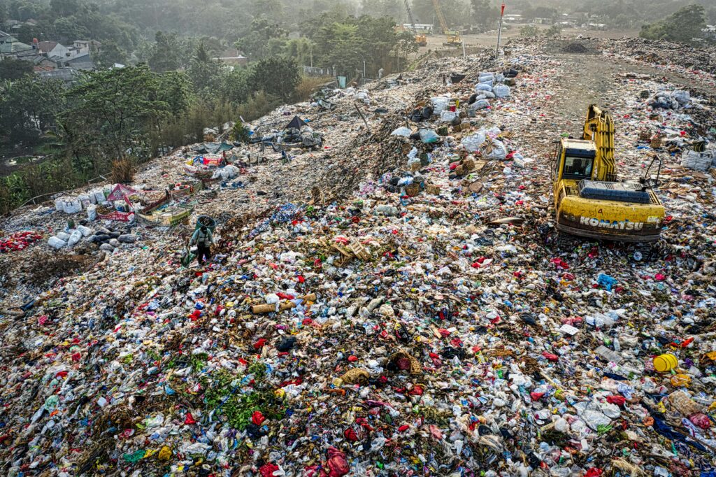 Aerial shot of a waste landfill in South Tangerang, showcasing pollution issues.